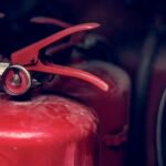 Closeup of red fire extinguishers